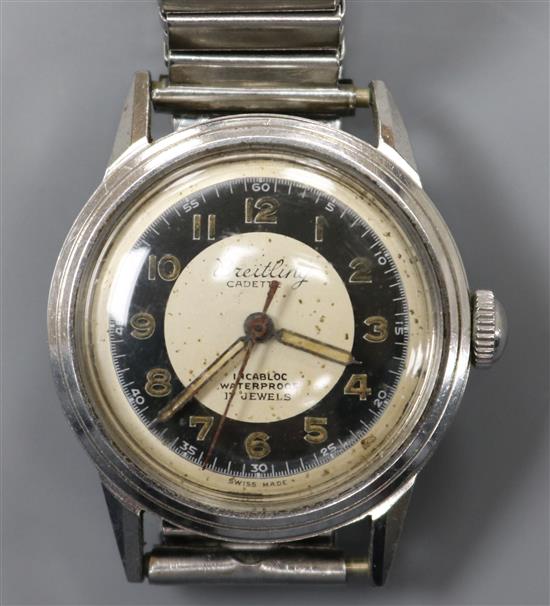 A stainless steel Breitling Cadette mid size manual wind wrist watch.